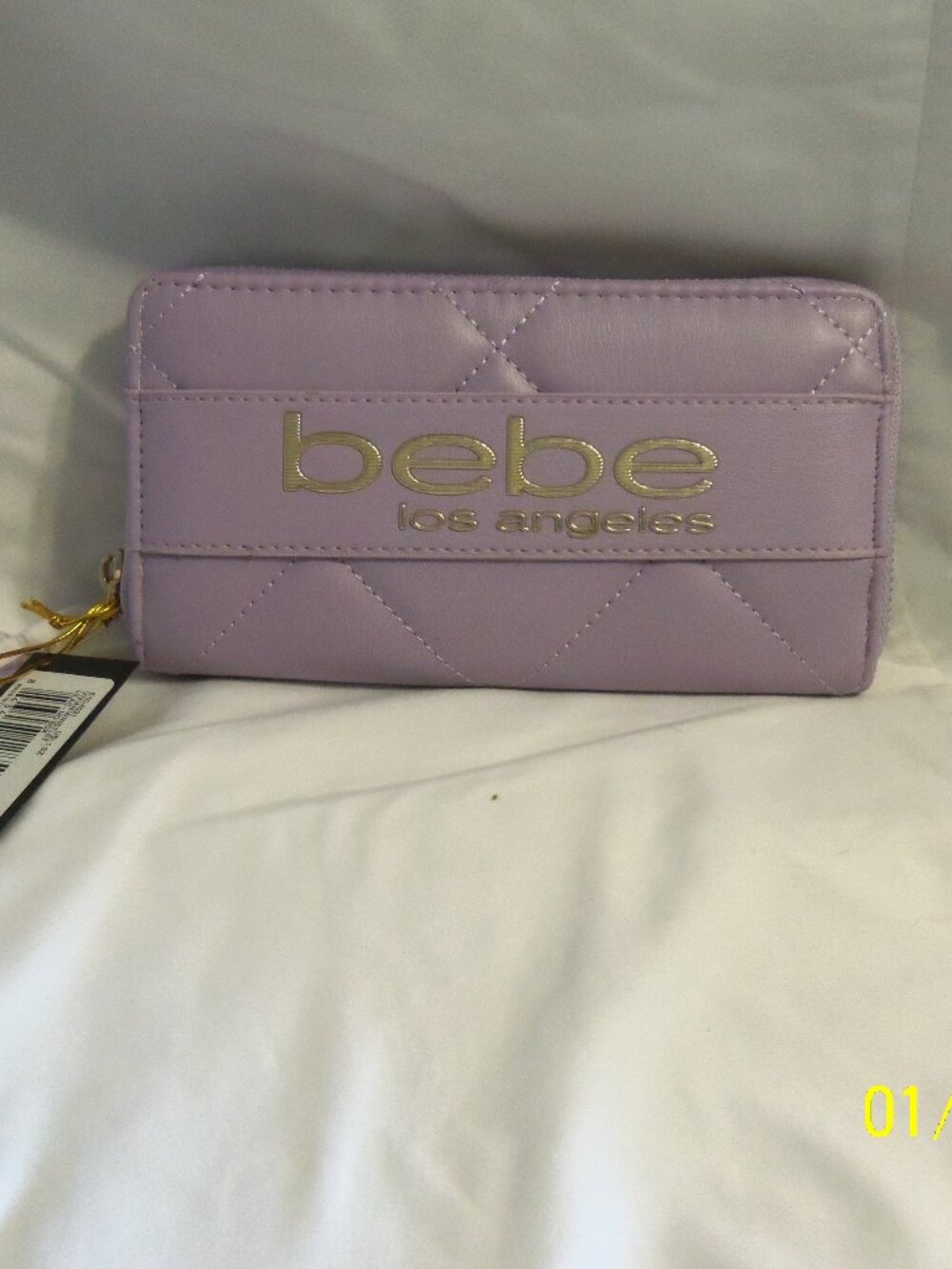 BeBe Zip Around Wrislet Lilac MSRP $49.00